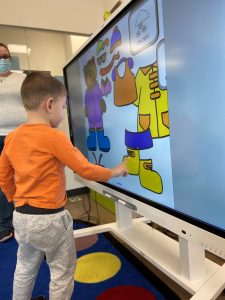 Child using Smart Board